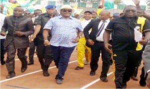Governor Willie Obiano of Anambra State (middle), and others jogging   after the inauguration of 8-lane Olympic standard tartan tracks at Rojenny Stadium in  Oba, recently.                        Photo: NAN