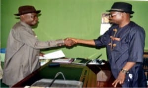 New Federal Commissioner, Public  Complaints Commission, Rivers State, Dr. Alpheaus Paul-Worika (right), in a handshake with his predecessor, Rt. Hon. Stephen Ezekwem at a handover ceremony, recently