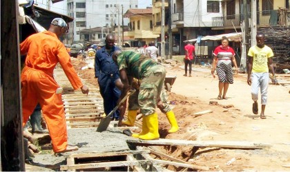 Nigerian Army Engineers reconstructing the Ezenwa Street in Onitsha North Local Government Area of Anambra State last Wednesday. Photo: NAN