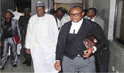 Former Governor of Jigawa State, Alhaji Sule Lamido (middle), at the Federal High Court in Abuja yesterday.