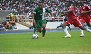 Dream Team VI’s Godwin Saviour (13) meandering past Congo players Sunday at the Adokiye Amesimaka Stadium, Port Harcourt.