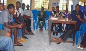 Paramount Ruler  of  Edagberi Community  in  Ahoada  West LGA of  Rivers State, Chief  Sunny Jacob Ubele  (right), presiding over a Council of  Chiefs meeting convened to  deliberate on oil leakage incident at Adibawa Oil field located within the  community on Monday.