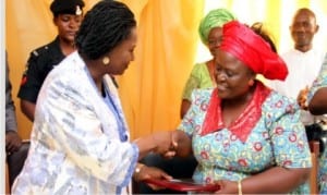 Rivers State Deputy Governor, Dr Ipalibo Banigo (left), receiving a plaque from the Principal, Government Girls Secondary School, Oromenike, Dr Augusta Fubara, during the school’s end of year/thanksgiving party in Port Harcourt, recently