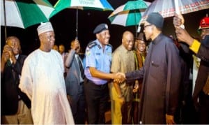 Inspector-General of Police, Mr Solomon Arase (3rd left) and other government officials, welcoming President Muhammadu Buhari at the Presidential Wing of Nnamdi Azikiwe International Airport in Abuja, yesterday after the president's 3-day trip to Washington DC.
