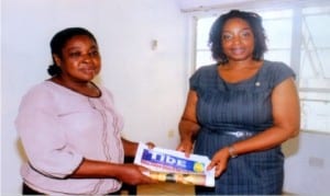 Director of Administration, Rivers State Newspaper Corporation (RSNC), Mrs Emi Jameson (left), presenting  copies of  The Tide newspaper to the President, Rotary Club of Port Harcourt, Rtn Anne Anyaka,when members of the club  paid a courtesy visit to the corporation in Port Harcourt on Wednesday         Photo: Egberi .A. Sampson