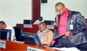 Leader of the Rivers State House of Assembly, Hon. Martin Amaewhule (right), presenting to the House an Amendment Law on Kidnapping in Rivers State at the sitting of the House in Port Harcourt, recently.                     Photo: Chris Monyanaga