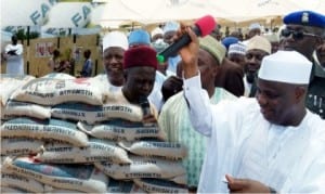 Governor Aminu Tambuwal (right), during the sale of fertilizer in Rabah Local Government Area of Sokoto State, yesterday