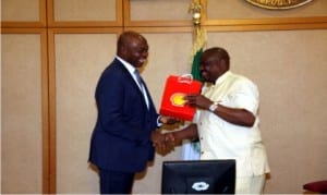 Governor Nyesom Wike of Rivers State, (right), receiving a souvenir from the Managing Director of Shell Petroleum Development Company of Nigeria (SPDC), Mr Osagie Okunbor, during a courtesy call in Government House, Port Harcourt, recently.