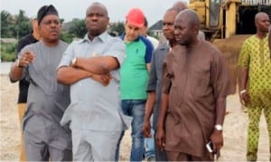 Rivers State Governor, Chief Nyesom Wike (middle), being briefed by Acting National  Chairman of PDP, Prince Uche Secondus (left), during an inspection tour of Trans-Woji Road, while Chief of Staff, Government House, Hon. Emeka Woke (2nd right), listens in Port Harcourt, yesterday. 