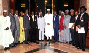 President Muhammadu Buhari (middle), Vice-President Yemi Osinbajo (7th left), Permanent Secretary, Ministry of Petroleum, Mr Taiya Haruna (6th right), Permanent Secretary, State House, Mr Nebolisa Emordi (2nd left), with directors in the Ministry of Petroleum, after a meeting with President Buhari at the Presidential Villa in Abuja, recently.