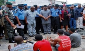 Governor Nyesom Wike of Rivers  State (3rd leftl), Commissioner of Police, Rivers Command, Mr Chris Ezike (2nd left), and National Chairman of PDP,  Prince  Uche Secondus (4th left), during the Parade of  Suspects  by the Commissioner of Police in Port Harcourt  recently 
