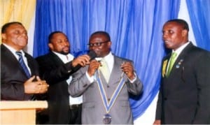 L-R: Prof Winston Bell-Gam, Rtn Orumabo Boma, immediate past President, Rtn Datonye Alasia and President, 2015/2016 Rotary Club of Port Harcourt, G.R.A, Rtn Gideon Etiaran, during the installation ceremony of the 6th Club President in Port Harcourt on SaturdayPhoto: Egberi A. Sampson