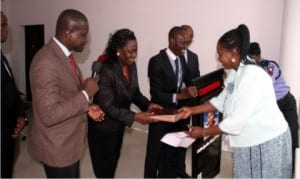 Rivers State Deputy Governor, Dr. (Mrs) Ipalibo Harry Banigo (right) receiving a souvenir from the delegation of Christian Medical and Dental Association, led by the State Chairman, Dr. Friday Aaron (left), when the latter paid a courtesy call on her in Government House, Port Harcourt, recently