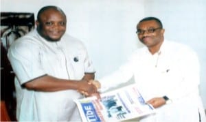 General Manager, Rivers State Newspaper Corporation, Mr Celestine Ogolo (right), presenting some copies of The Tide to President, Rotary Club of Por Harcourt Central, Rtn. Paul Ben-Cookey, when members of the Rotary Club paid a courtesy visit to the corporation in Port Harcourt, yesterday. Photo: Egberi A. Sampson.