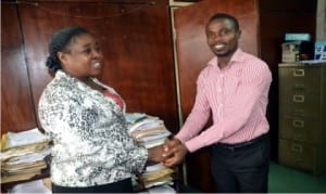 Director of Administration, Rivers State Newspaper Corporation, Mrs Emi Jameson (left), congratulating the newly elected Chairman of Nigeria Union of Civil Service Secretarial and Stenographic Workers (NUCSSASW), The Tide Chapel, Comrade Fred-Horsfall Adaye, shortly after his victory as chairman at The Tide Unit office on Wednesday. Photo: Nwiueh Donatus