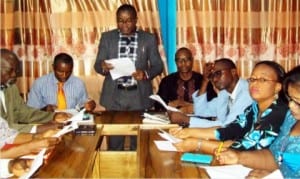 The 1st Deputy President of Onitsha Chamber of Commerce, Mr Donatus Ebubeogu (standing), reading the communiqué of the 8th annual lecture series of ``the Perspective'' of the Onitsha Chamber of Commerce, Industry, Mines and Agriculture (ONICCIMA) in Onitsha, Anambra State, on Tuesday