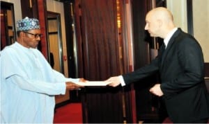 President Muhammadu  Buhari (left), receiving letter of credence from the Ambassador designate of Poland to Nigeria, Mr Andrzej Dycha, at the Presidential Villa in Abuja, yesterday .