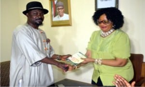 Commissioner, Public Complaints Commission, Dr Alpheaus Paul-Worika (left), presenting the commission’s document to the General Manager, RSTV, Pastor Dafini Gogo-Abbey, during the commissioner’s working visit to RSTV, in Port Harcourt, yesterday.