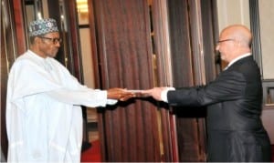 President Muhammadu Buhari (left), receiving letter of credence from the Ambassador designate of the Kingdom of Belgium to Nigeria, Mr Stephane De Loeckeras, at the Presidential Villa in Abuja on Thursday.