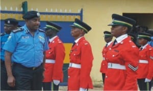 Inspector General  of Police, Mr Solomon Arase (left) inspecting guard of honour during a visit to the Rivers State Police Command in Port Harcourt     Photo: Ibioye Diama