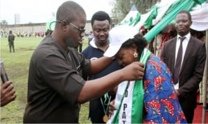 National Auditor, National Youth Council of Nigeria, Comrade Moses Odeghe (left),decorating the Rivers State Deputy Governor, Dr Ipalibo Banigo, who represented the governor, during the 2015 International Youth Day celebration in Port Harcourt on Wednesday