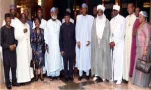  L-R: President Muhammadu Buhari (middle), former Head of State and Chairman of 2015 Election Peace Committee, General Abdulsalami Abubakar (rtd)(4th left), Vice President Yemi Osinbajo (5th left), Sultan of Sokoto, Alhaji Muhammad Sa'ad Abubakar III (5th right), National President, Christian Association of Nigeria (CAN), Pastor Ayo Oritsejafor (4th right), John Cardinal Onaiyekan (3rd right) and other members of the committee, during their courtesy visit to President Buhari at the Presidential Villa in Abuja on Tuesday. 												     Photo: NAN