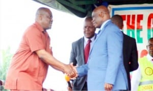 Rivers State Governor,  Chief Nyesom  Wike (left), and the General Overseer of the Lord's Chosen Renewal Charismatic Ministry, Pastor Lazarus Mouka (right),  at a special  crusade  of the church in Port Harcourt, yesterday. 