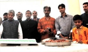 Indian High Commissioner to Nigeria, Mr Ajjampur Ghanashyam (left), cutting a cake to mark India’s 69th Independence Day Celebration day in Abuja on Saturday