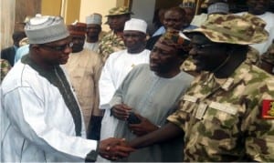 Governor Ibrahim Gaidam of Yobe State (left), welcoming the Chief of Army Staff, Lt.-Gen. Tukur Buratai and National Ssecurity Adviser, Retired Maj.-Gen. Babagana Monguno, during  their visit to Damaturu on Saturday.        Photo: NAN 