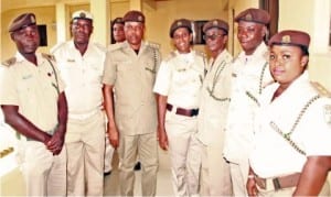 Newly promoted officers of the Nigeria Immigration Service, Bayelsa State Command, after their decoration in Yenagoa on Tuesday. Photo: NAN