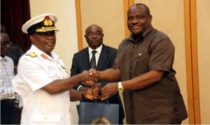 Governor Nyesom Wike (right), in a handshake with Chief of Naval Staff, Vice Admiral Ibok-Ete Ibas (left), during a courtesy call on the governor at Government House, Port Harcourt, recently.