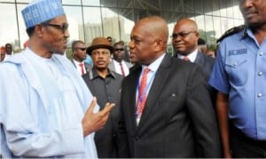 L-R:President Muhammadu Buhari (left), Anambra State Governor, Willie Obiano (2nd left),  formerAbia State  Governor /publisher of The Sun newspaper,   Dr Orji Uzor Kalu (2nd right), and Police IG, Mr Solomon Arase, at the 2015 National Security Summit in Abuja on Monday 