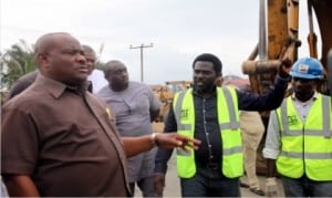 Governor Nyesom Wike of Rivers State, with Project Manager, Monier Construction Company, Mr. Collins Wonodi (2nd left), during the inspection of the Rumuolumeni Road project by the governor in Port Harcourt recently.
