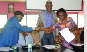 Chairman, Rivers State Civil Service Commission, Chief Oris Onyiri (left), in a handshake with Director, Code of Conduct Buren, Rivers State, Mrs S. Isokariari, shortly after her presentation, during a two-day seminar organised by the commission for repositioning of the State’s Civil Service in Eleme on Tuesday .          Photo: Nwiueh Donatus Ken