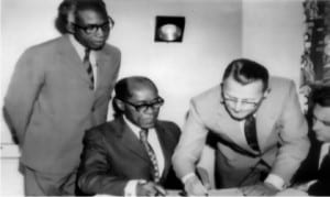 Pioneer General Manager, RSBC, Gabriel Okara (left), Pioneer Secretary to Rivers State Government, Pikibo Oju-Daniel Kalio (2nd left) and officials of a foreign firm contracted to install RSBC-TV, during the signing of agreement in 1973.