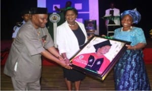 Rivers State Deputy Governor, Dr. Ipalibo Harry-Banigo (middle), receiving the Roll of Honour Award and a portrait from Prof. Alice R. Nte of the Nigeria Medical Association (right) and the State Chairman of the association, Dr. Furo Green, during a dinner and award night in Port Harcourt on Saturday.