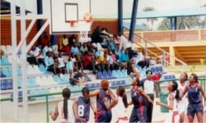 Women basketballers in action contesting for victory in a match