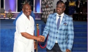 Rivers State Governor, Chief Nyesom Wike (left), in a handshake with General Overseer Royal House of Grace, Apostle Zilly Aggrey,    during the 23rd Anniversary of the church in Port Harcourt.