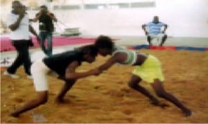 Young female wrestlers showing off their talents in a grassroots competition