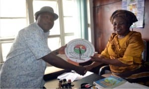 Rivers State Chairman of AUPCTRE, Comrade Henry Urombo, presenting a gift to the Director, Administration, Rivers State Newspaper Corporation, Mrs Emi Jameson, during the inauguration of The Tide Unit Exco in Port Harcourt on Friday.        Photo: Nwiueh Donatus Ken