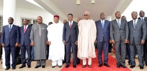 L-R: ECOWAS  Commission President, Kadre Ouedraogo, Prime Minister of Guinea, Mohammed Said  Fofana, Presidents of Ghana, John Dramani  Mahama, Niger Republic, Mohamadou Issoufou, Benin Republic, Boni Yayi; Nigerian, Muhammadu Buhari, Republic of Senegal, Macky  Sall, Togo , Faure Gnassingbe, Cote’ D’Ivoire, Alassane Quattara and Prime Minister of Mali, Modibo Keita, during the extraordinary meeting of ECOWAS authority of Heads of State and Government on the political  crises in Burkina Faso at the Nnamdi Azikiwe International Airport in Abuja, yesterday.