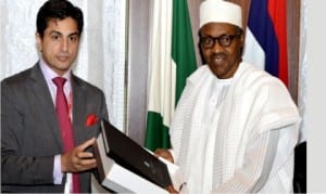 President Muhammadu Buhari (right), receiving Centenary City documents from Executive Director for Africa, Eagle Hills, Mr Jaimal Shergill, during a meeting of the Centenary City Board members with the President at the Presidential Villa in Abuja, last Friday