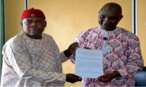Permanent Secretary, Rivers State Ministry of Information and Communications, Mr. Sam Woka (right), receiving a souvenir from President-General, League of Character Club of Nigeria. Chief Christain Kokoriko,during a coutesy call on the Permenent Secretary in Port Harcourt on MondayPhoto: Ibioye Diama