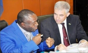 Permanent Secretary, Ministry of Water resource, Mr Musa Istifanus (left), discussing with the keynote speaker, Mr Raanan Adin, at the 2015 WAIEC Exhibition and Conference in Abuja recently.