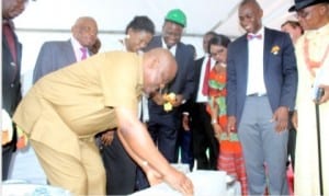 Rivers State Governor, Chief Nyesom Ezenwo Wike (left), performing the foundation laying of NLNG head quarters building in Port Harcourt, yesterday.