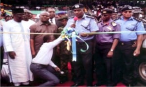 The Inspector General of police, Solomon Arase (middle), commissioning patrol vans donated by Governor Wike in Port Harcourt.  Inset: The patrol vans