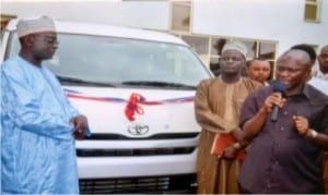 Chief of Staff, Government House, Port Harcourt, Engr Emeka Woke (right) addressing sports journalists in Port Harcourt when the state government donated a bus to them. Photo: Chris Monyanaga