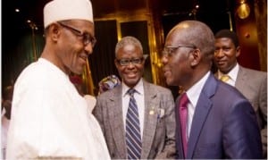 President Muhammadu Buhari (left), with the Permanent Secretary, Ministry of Foreign Affairs, Amb. Bulus Lolo,(right), after the latter briefed the President on activities of his ministry, at the Presidential Villa in Abuja yesterday. With them is Director-General, Nigerian Institute of International Affairs, Prof. Bola Akinterinwa (middle).