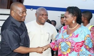 Rivers State Executive Governor, Chief Nyesom Wike (left), being received by his Deputy, Dr. (Mrs) Ipalibo Harry-Banigo on his arrival at the Port Harcourt International Airport, after the verdict of the Governorship Election Tribunal sitting in Abuja on Saturday. With them is former Deputy Speaker, House Representatives, Hon. Austin Opara,