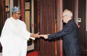 President Muhammadu Buhari (left), receiving a letter of credence from the Ambassador Designate of the Slovak Republic to Nigeria, Mr Peter Holasek, at the Presidential Villa in Abuja,yesterday
